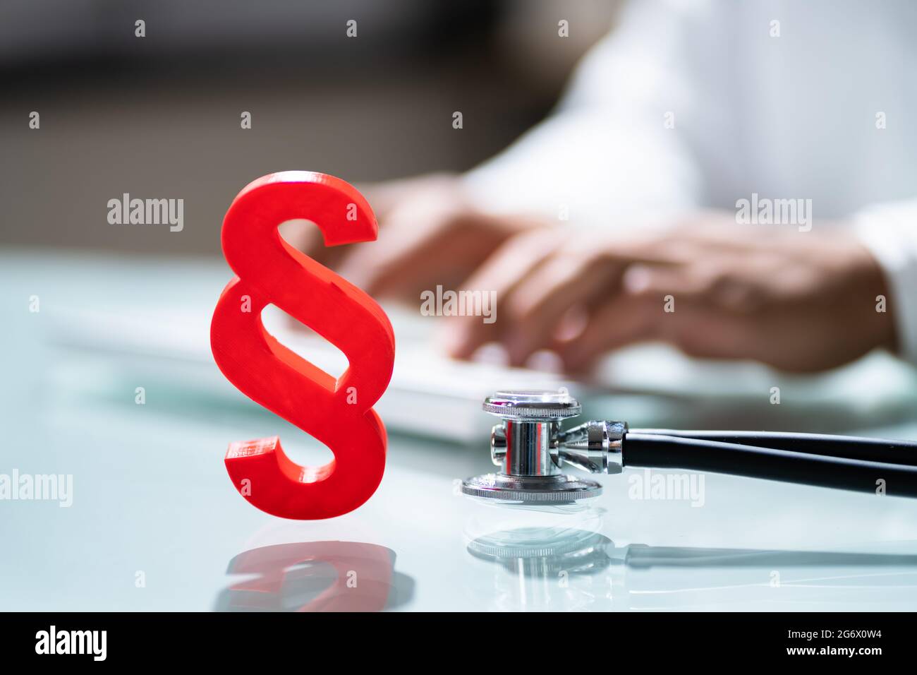 Medical Malpractice In Healthcare. Stethoscope And Paragraph Stock Photo