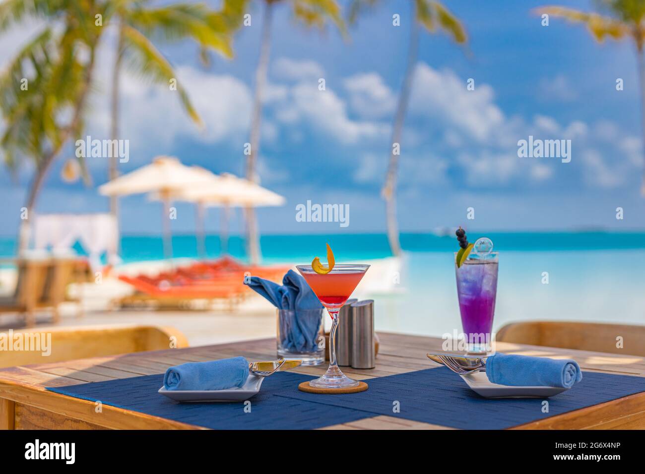 Luxury resort hotel poolside, outdoor restaurant on the beach, ocean ...