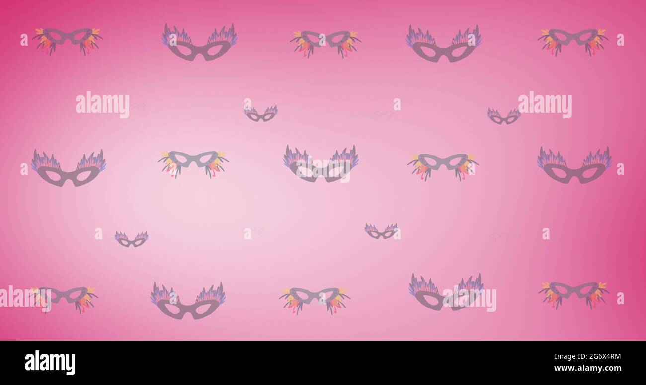 Composition of masquerade masks repeated in rows, on graduated pink ...