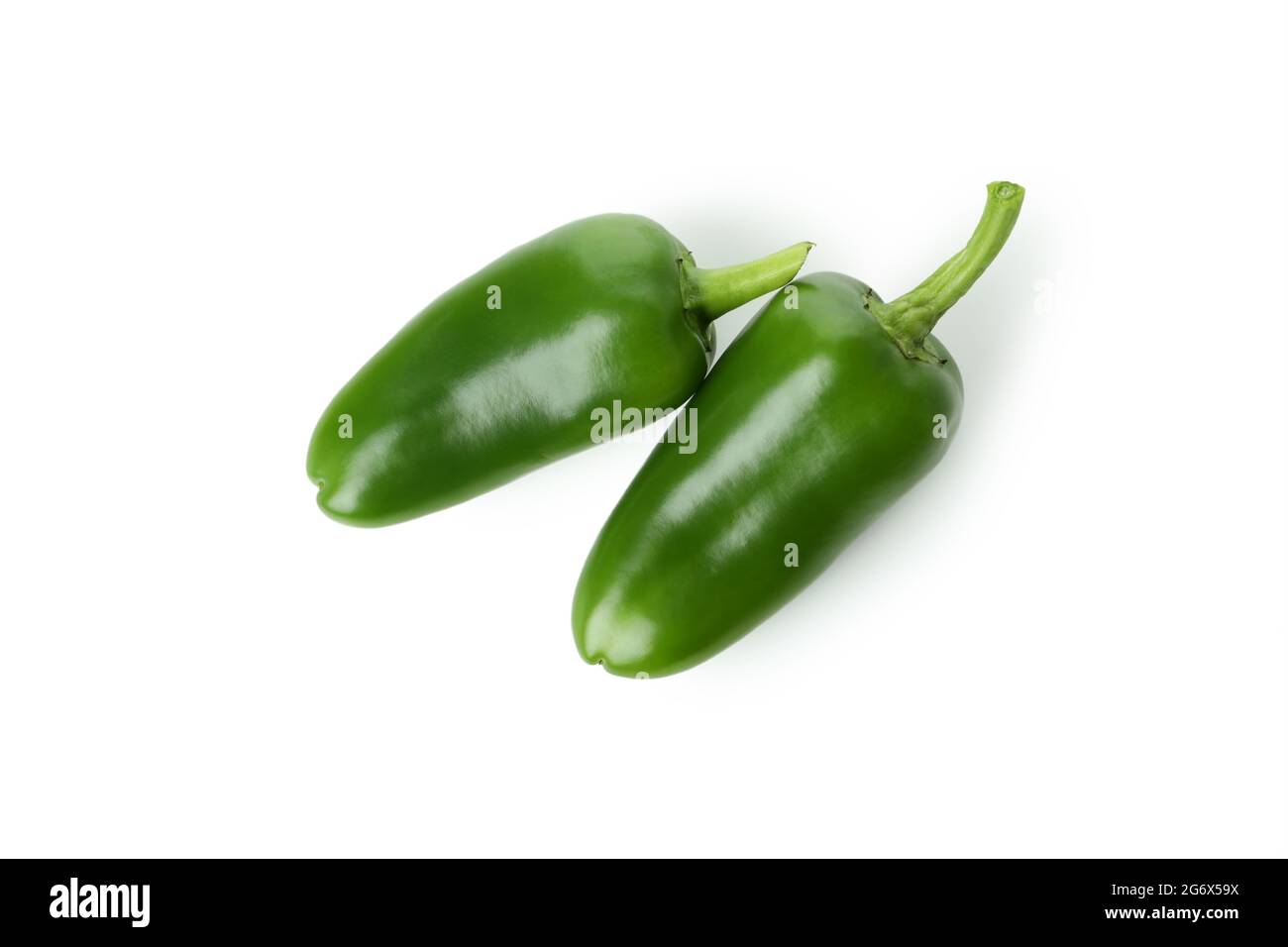 Green hot peppers isolated on white background Stock Photo - Alamy