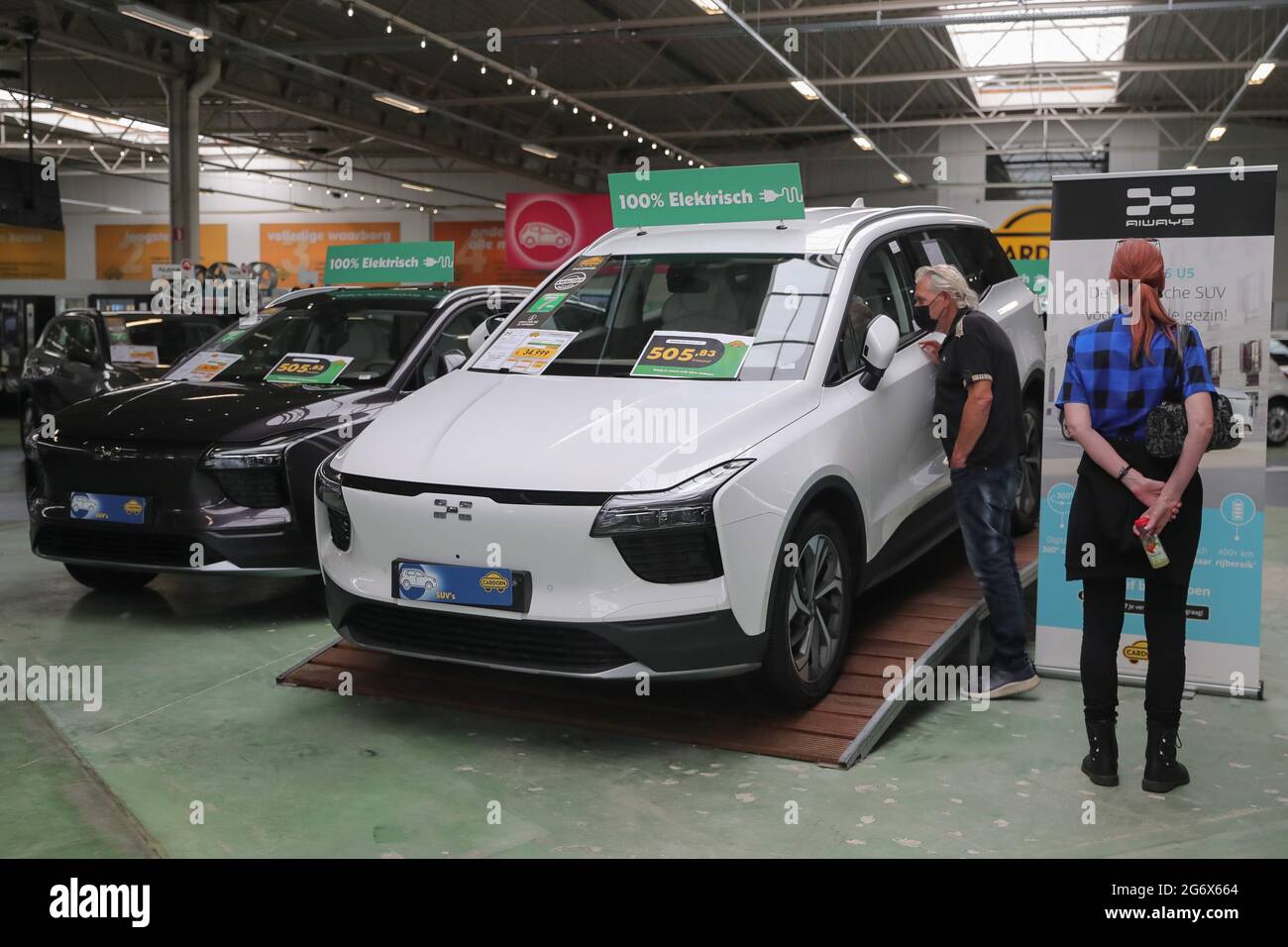 Antwerp, Belgium. 8th July, 2021. Visitors learn about Aiways electric