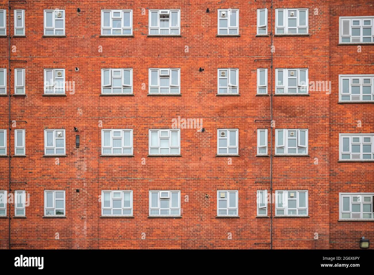 Facade of a red brick mansion block around Hackney in London Stock Photo