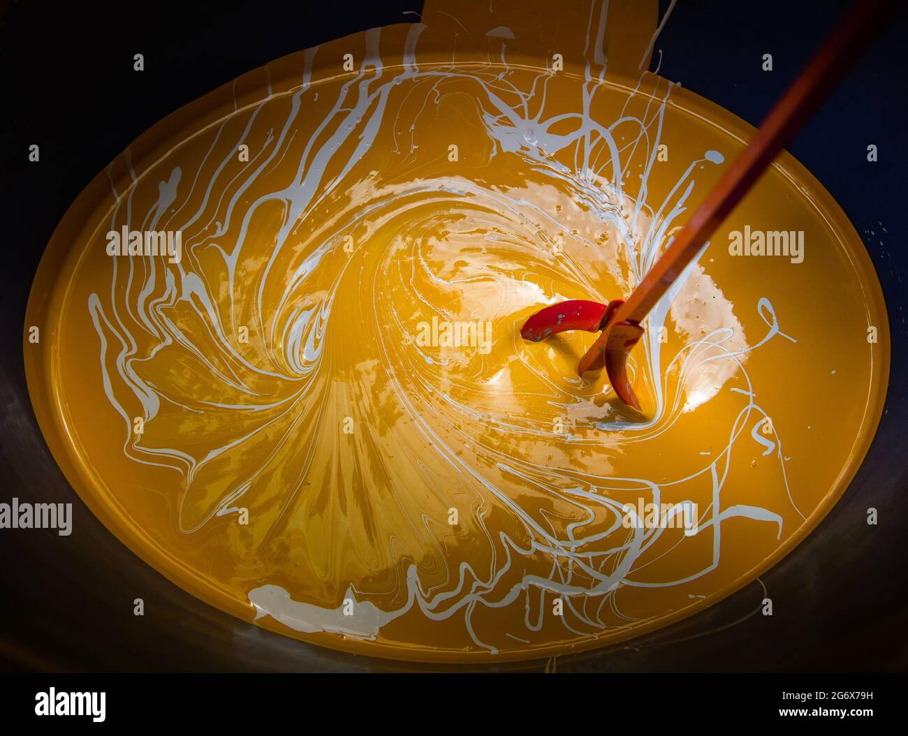 Paint stirring tool for mixing different color paint together. Mixing