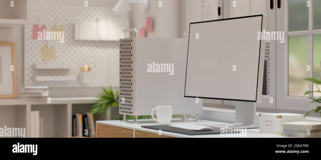 Computer monitor with empty screen decorated with computer device ...