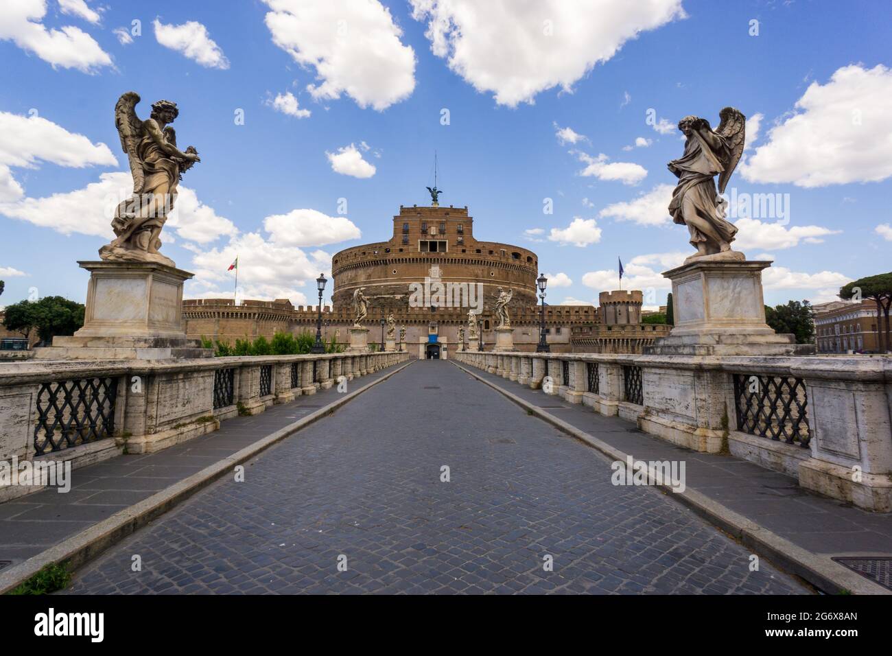Ponte Sant'Angelo bridge crossing the river Tiber and Castel Sant'Angelo (AD 135) also know as mausoleum of Hadrian in Rome, Italy Stock Photo