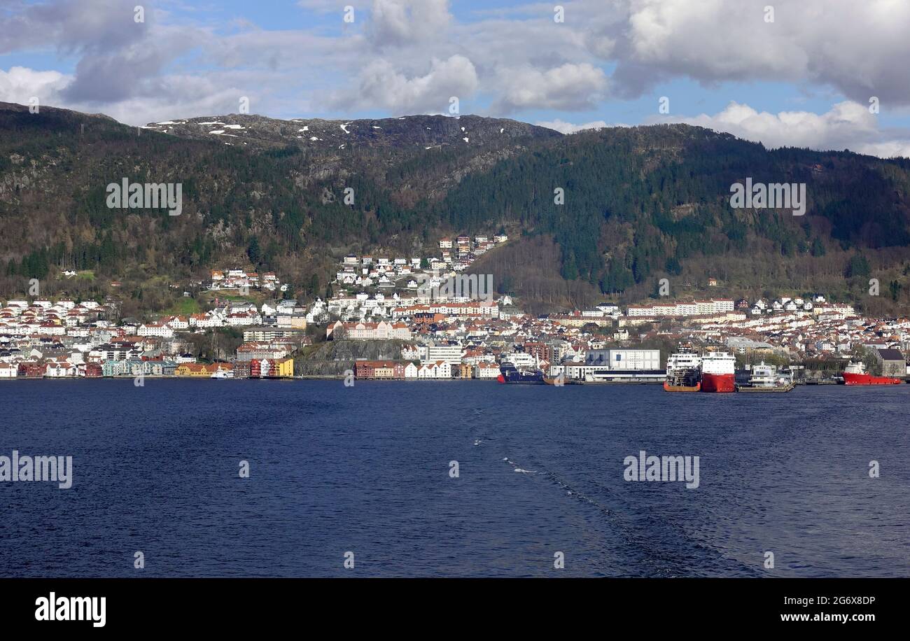 Panoramic view of Bergen from rear of cruise ship showing shoreline and mountains. Stock Photo