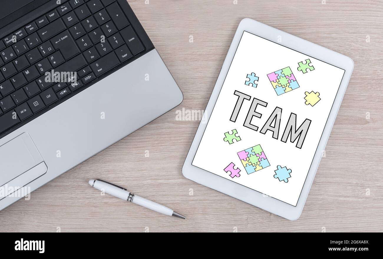 Team concept shown on a digital tablet Stock Photo