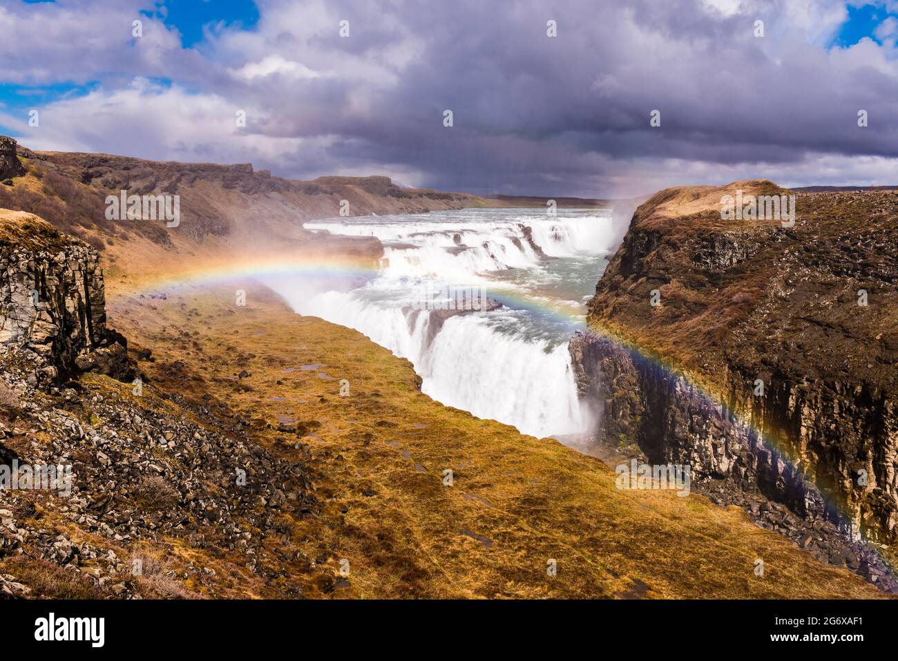 rainbow-in-the-spray-at-the-mighty-gullfoss-falls-in-iceland-stock