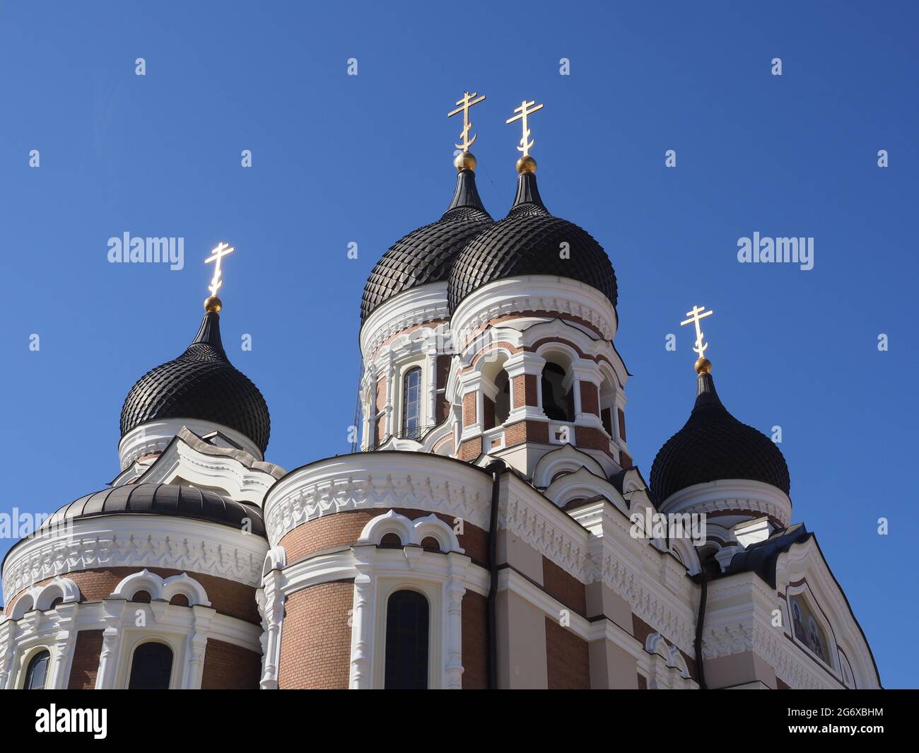 Alexander Nevsky Cathedral, Tallinn. Close up of the black domed roof against bright blue sky Stock Photo