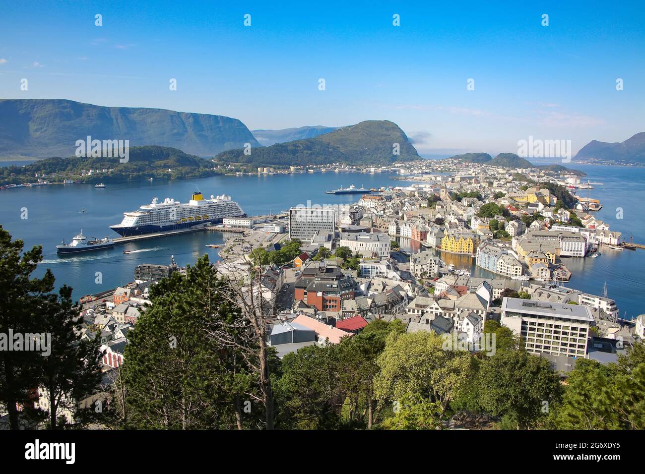 View of Alesund; Panoramic view of the archipelago, the beautiful town centre, art nouveau architecture and fjords from Aksla, Alesund, Norway. Stock Photo