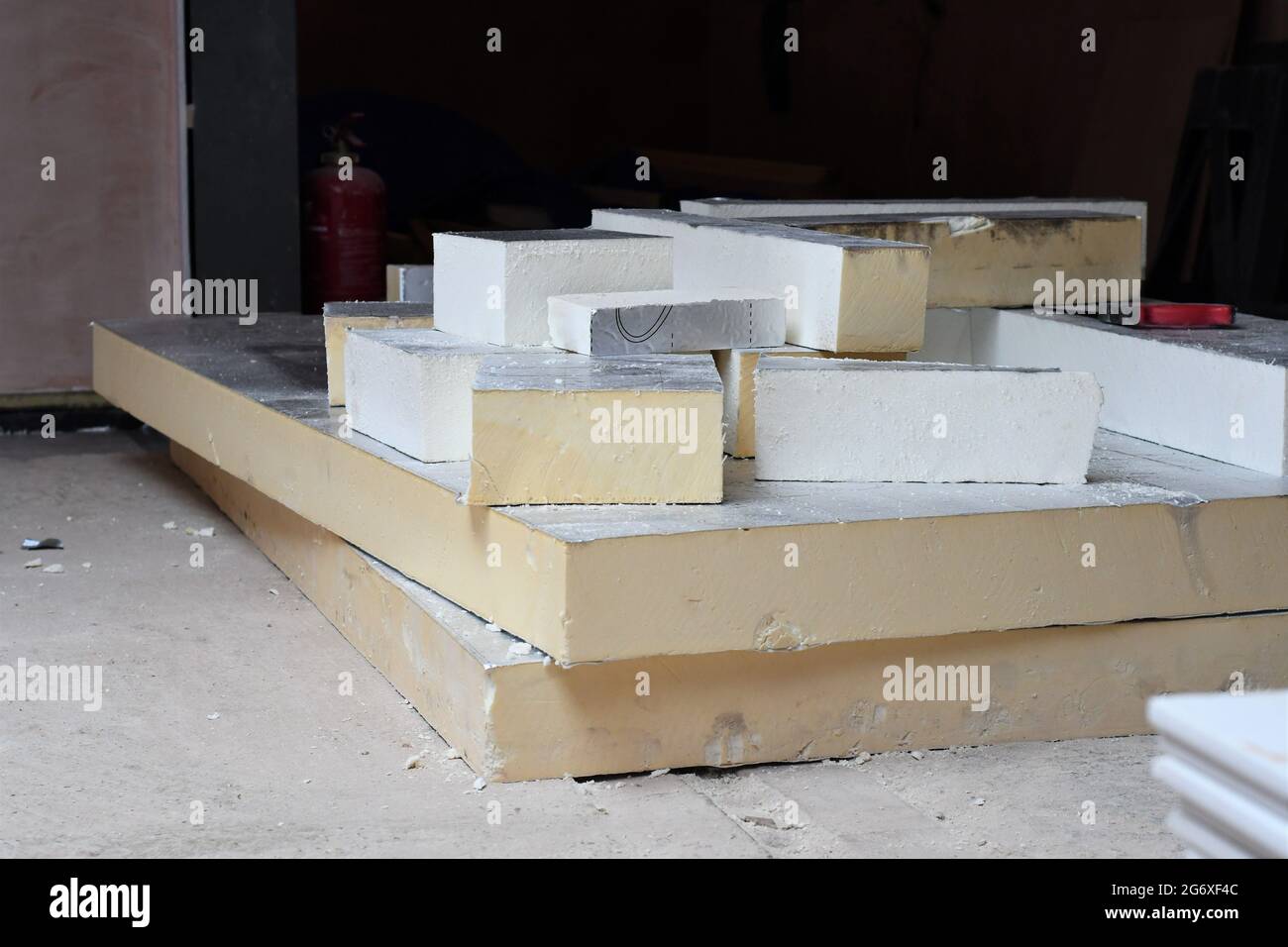 A pile of insulation board celotex on a building site Stock Photo