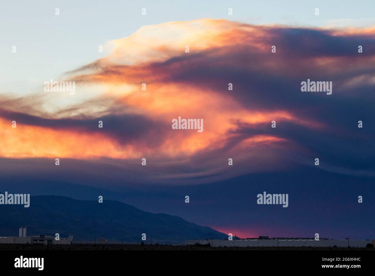 Smoke rises from the Beckwourth complex fire at sunset.The Beckwourth
