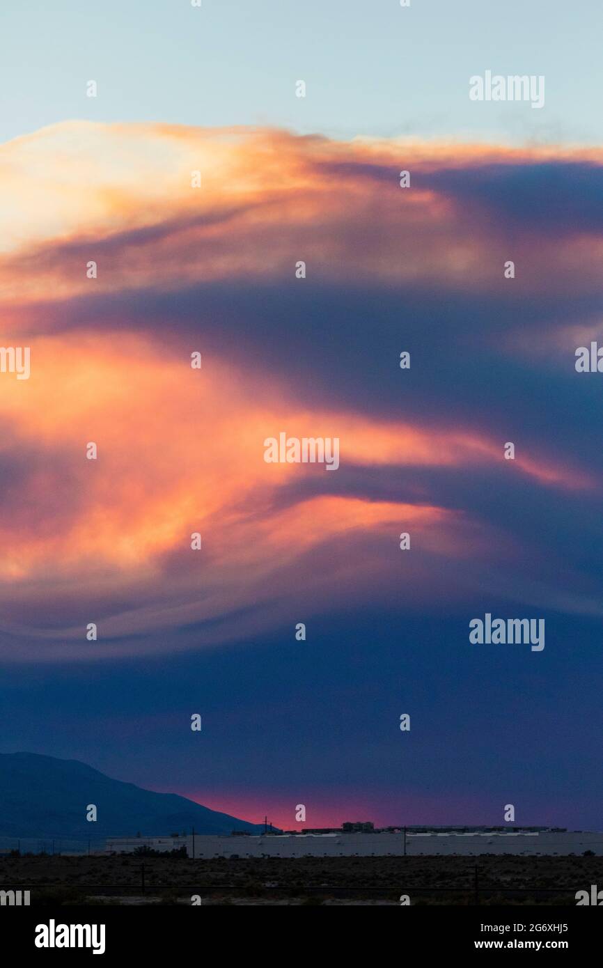 Smoke rises from the Beckwourth complex fire at sunset.The Beckwourth