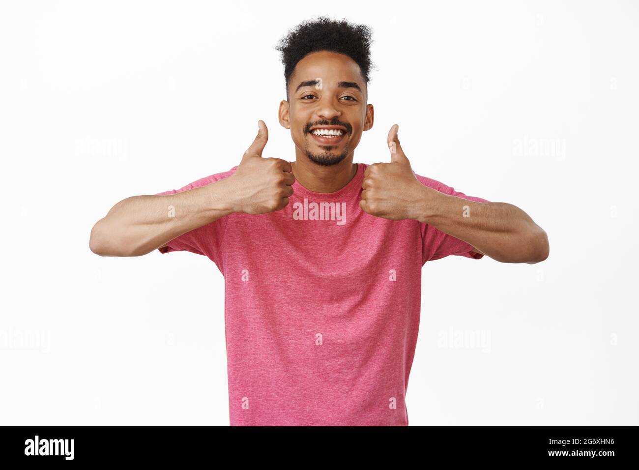 Black guy showing thumbs up hi-res stock photography and images - Alamy