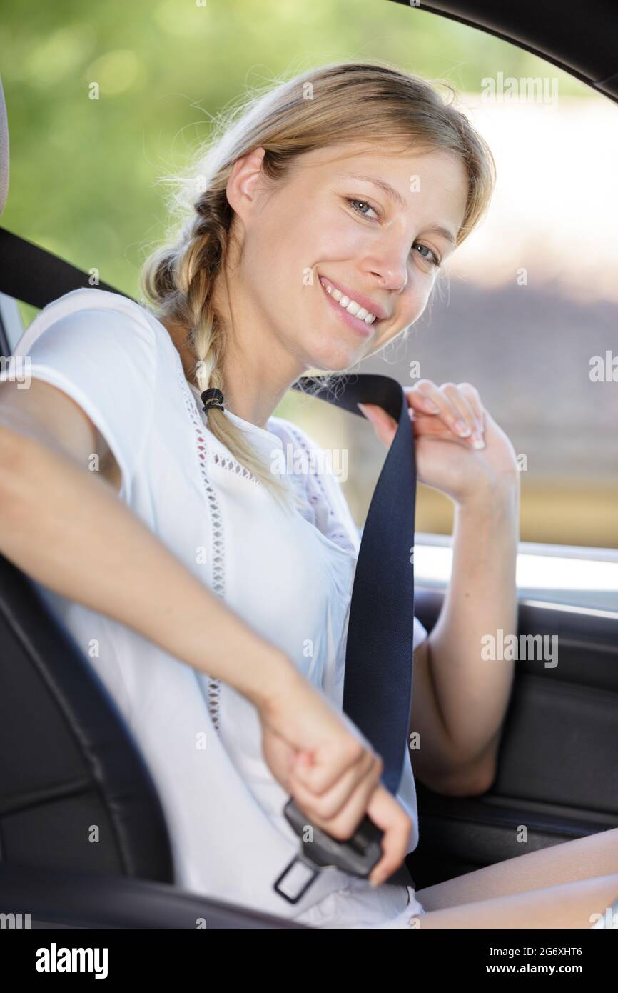 Woman wearing seat belt hi-res stock photography and images - Alamy