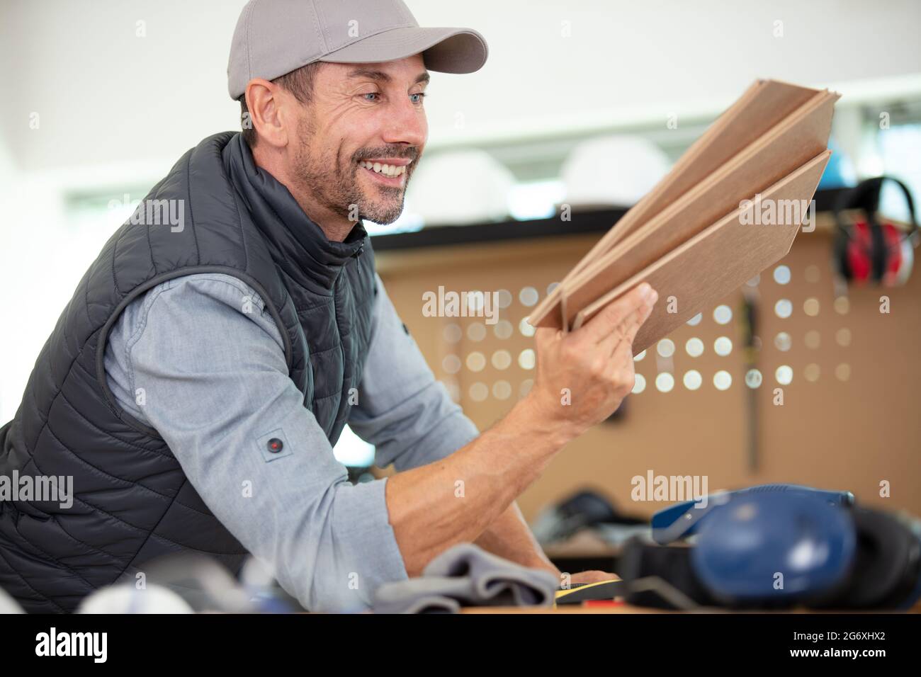 happy male carpenter in workshop Stock Photo