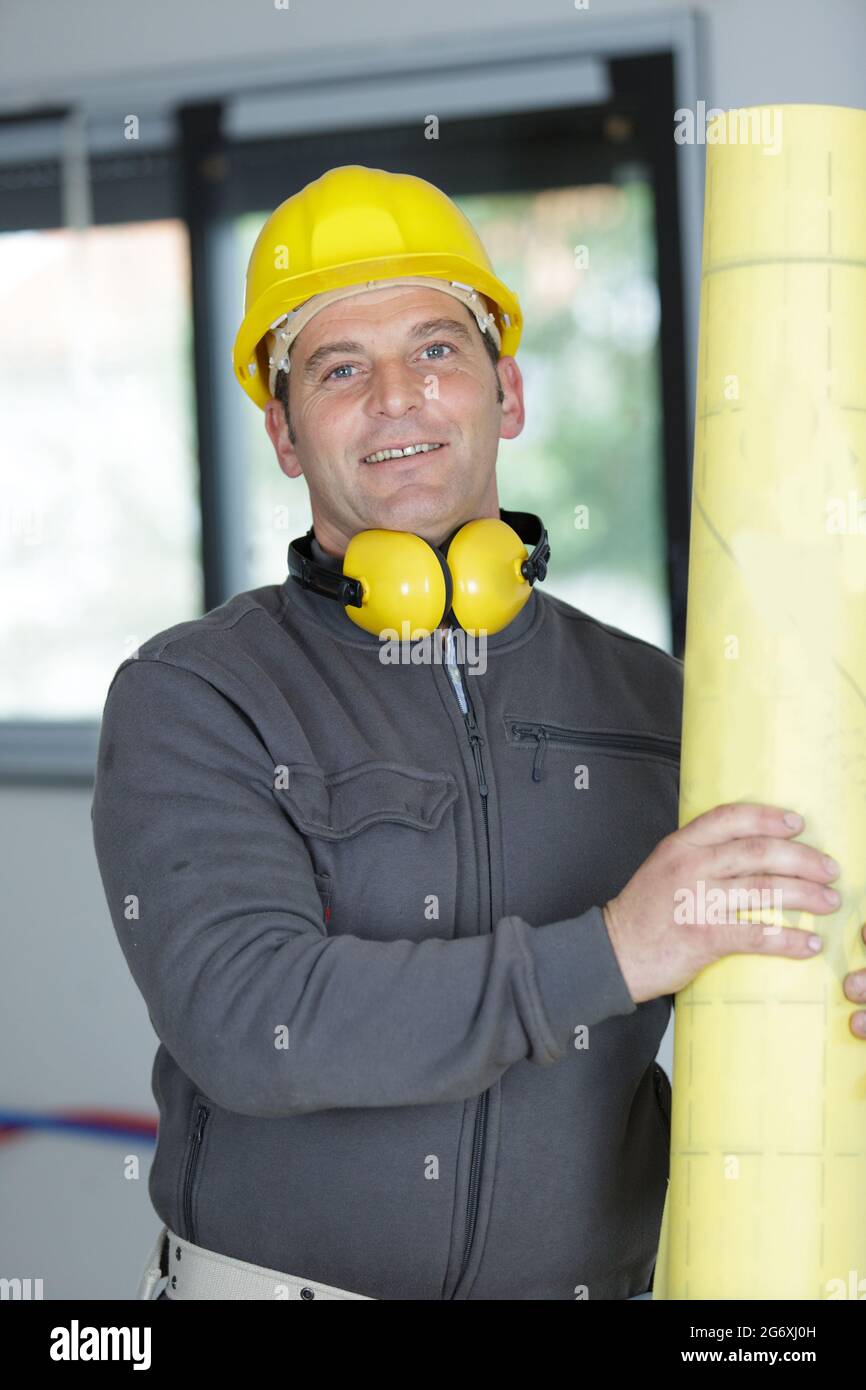 Yellow wear hearing protection hi-res stock photography and images - Alamy