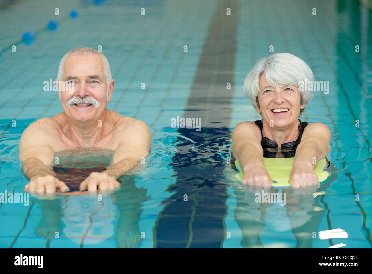 elderly couple doing swimming drill exercises Stock Photo Alamy