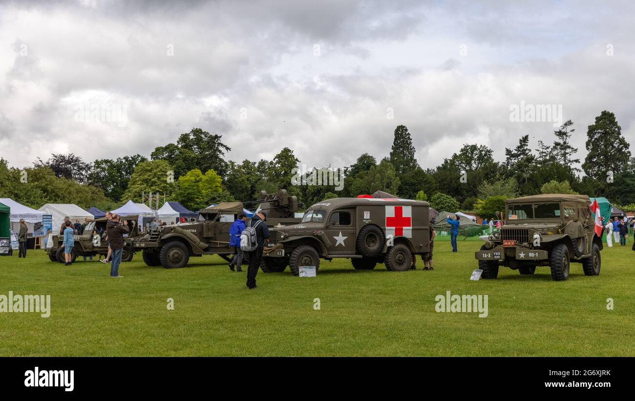 Dodge WC58 command car, WC-54 Ambulance, M3 Half-track armored personnel Carrier & M38 Jeep on display at Shuttleworth Military show on the 4 July 21 Stock Photo