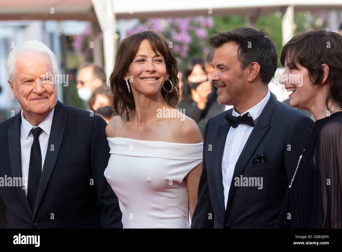 Andre Dussollier (l-r), Sophie Marceau, Francois Ozon and Geraldine Pailhas attend the premiere of 'Tout S'est Bien Passe' (Everything Went Fine) during the 74th Annual Cannes Film Festival at Palais des Festivals in Cannes, France, on 07 July 2021. Stock Photo