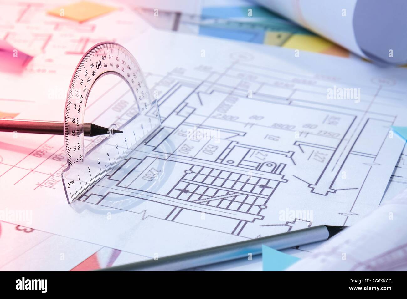 https://c8.alamy.com/comp/2G6XKCC/a-pencil-with-a-protractor-architectural-project-drawings-with-tools-architects-workplace-engineering-interior-designers-working-table-2G6XKCC.jpg
