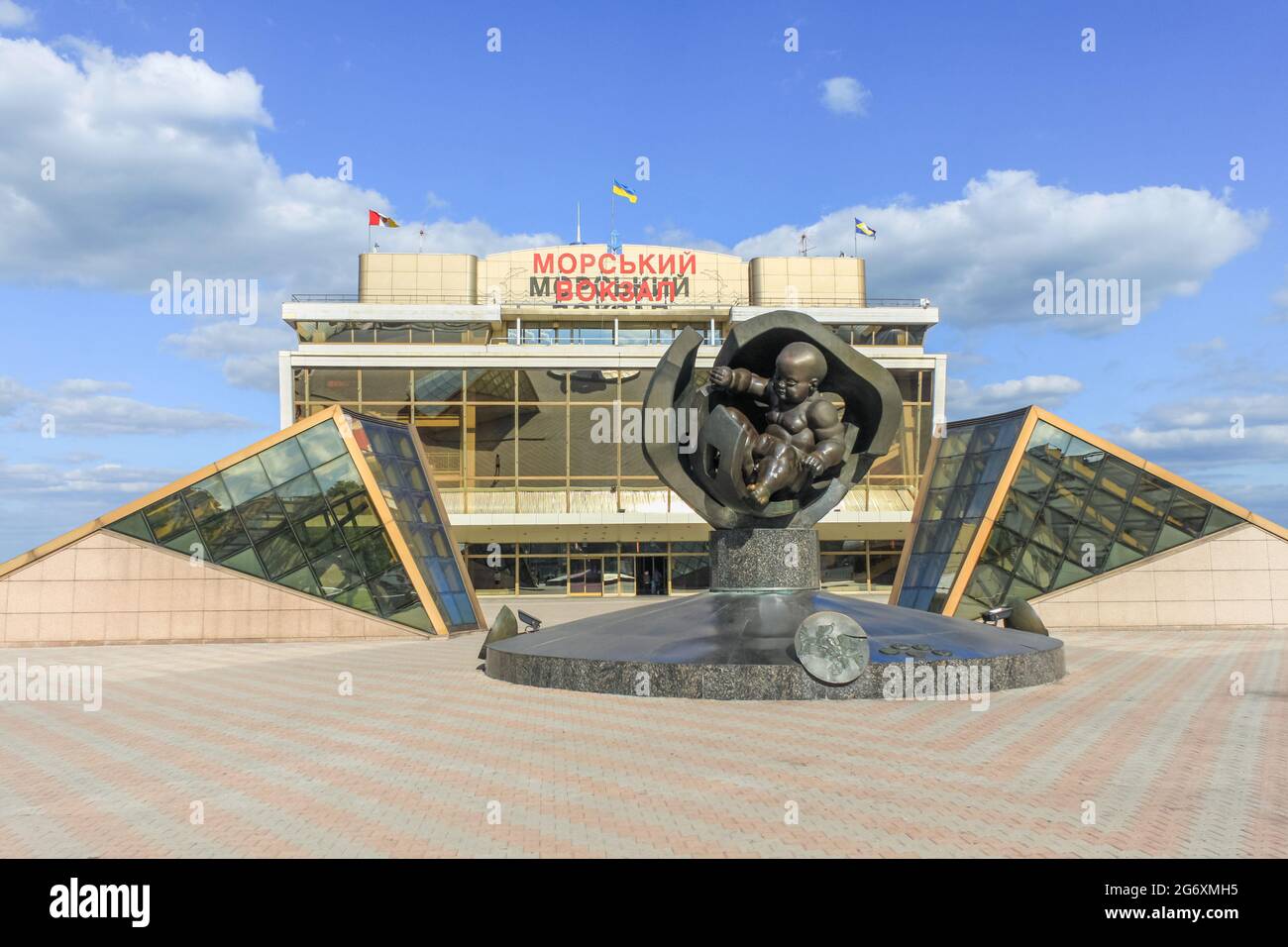 Odessa, Ukraine, October 9, 2012: The building of the sea station and the sculpture of the baby in the city of Odessa Stock Photo