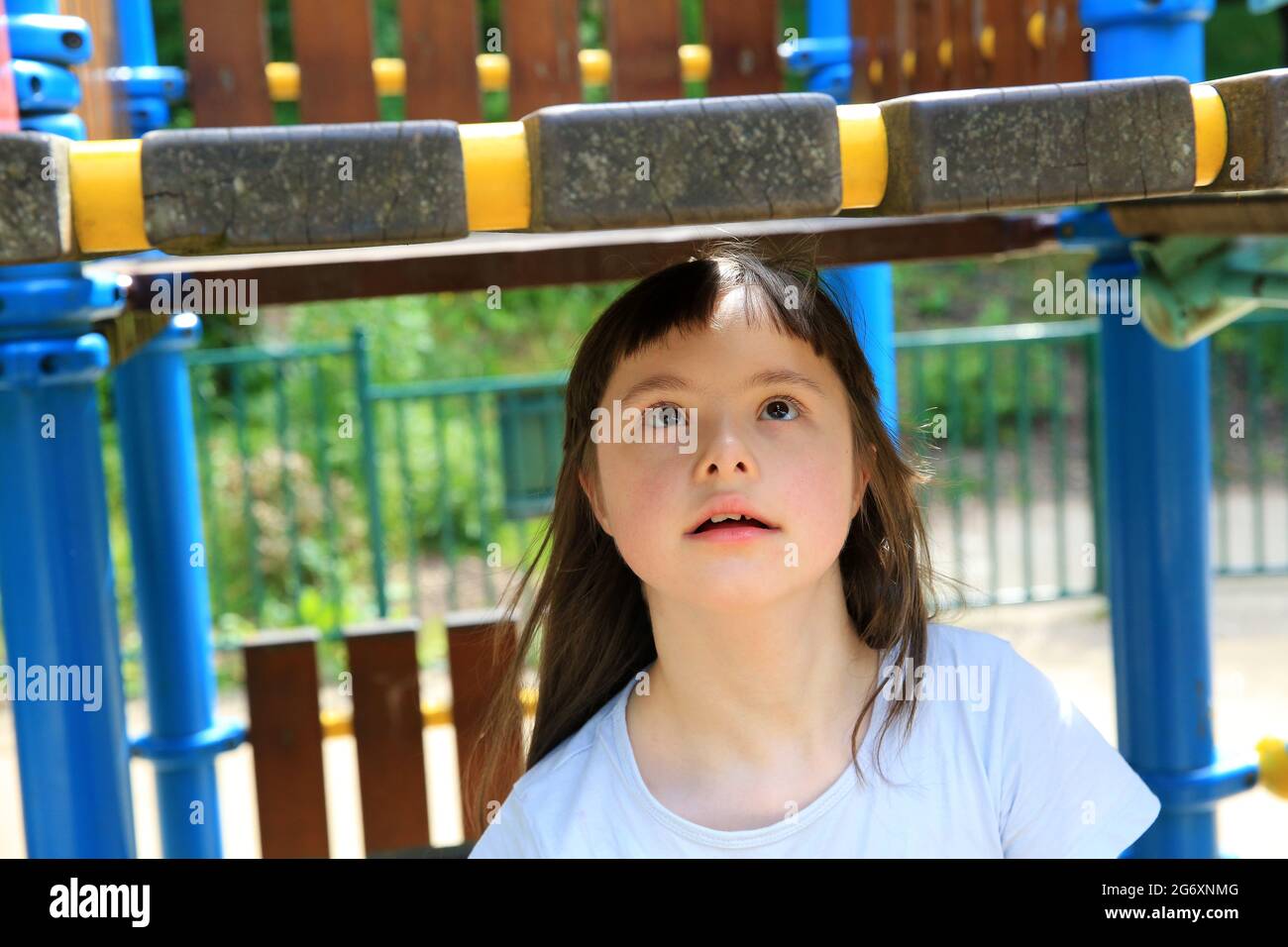 Portrait of little girl in the playground Stock Photo - Alamy