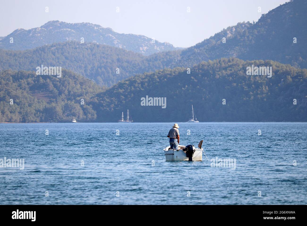 Fisherman water boat hi-res stock photography and images - Alamy