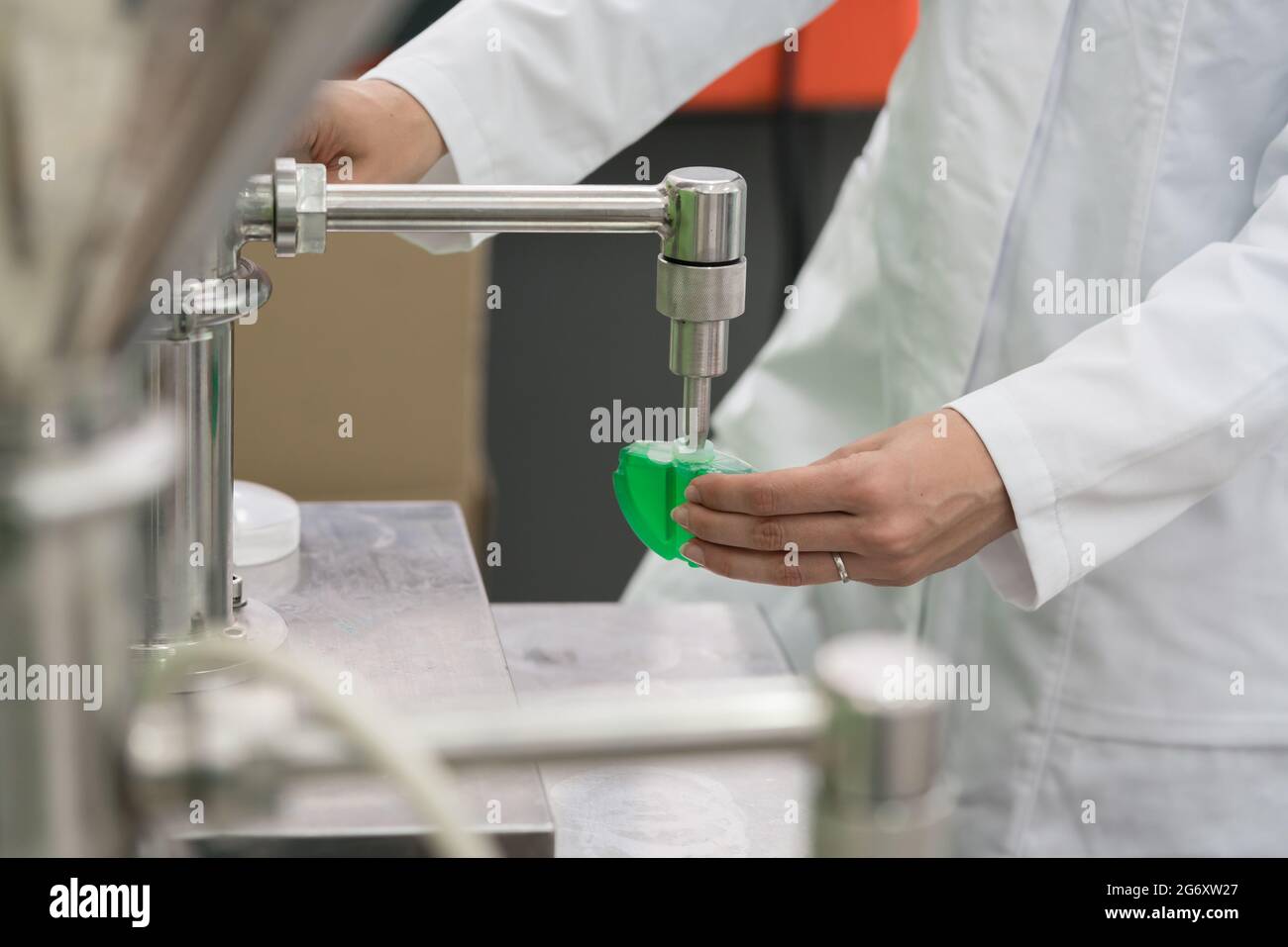 Technician filling container liquid hi-res stock photography and images ...