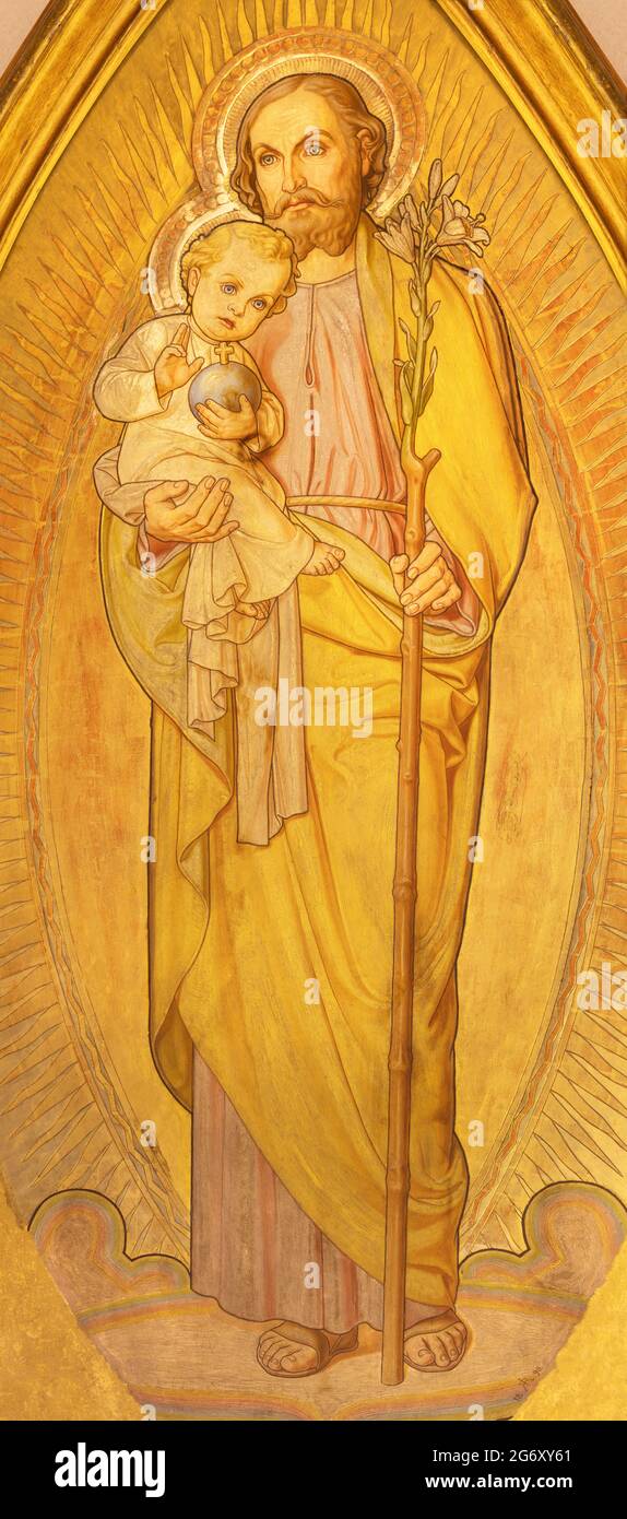 VIENNA, AUSTIRA - JUNI 24, 2021: The painting St. Joseph in the church Marienkirche by unknown artist from end of 19. cent. Stock Photo