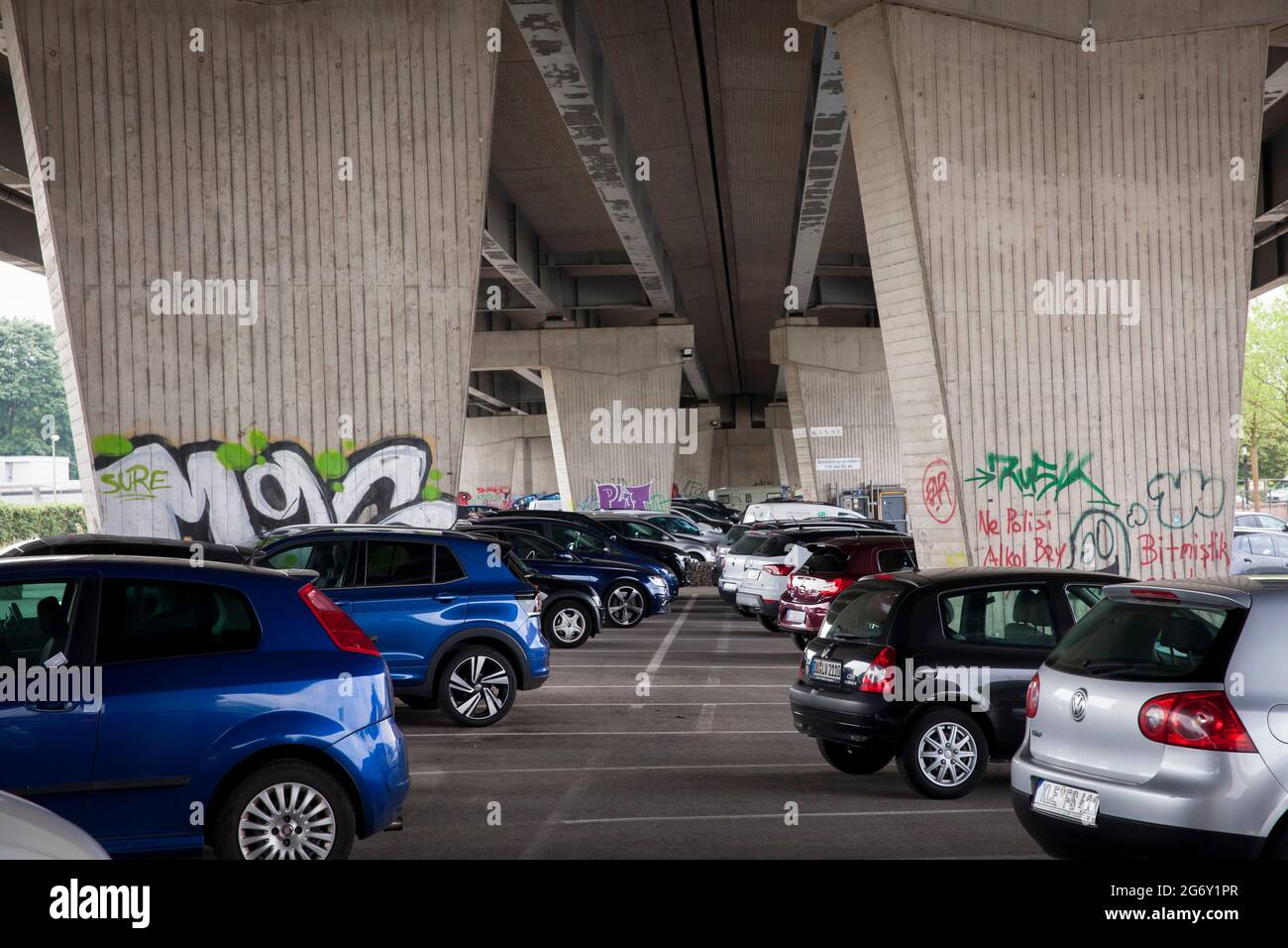 parking under a bridge of the A 59 freeway in the Inner Harbour Duisburg, North RhineWestphalia
