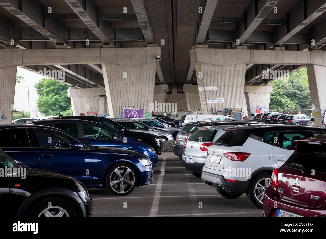 parking under a bridge of the A 59 freeway in the Inner Harbour Duisburg, North RhineWestphalia