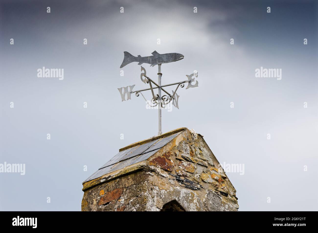 Pictured: The weathervane on top of the seaside chapel. Wednesday 02 June 2021 Re:  The village of Cwm-yr-Eglwys where most of the houses are holiday Stock Photo