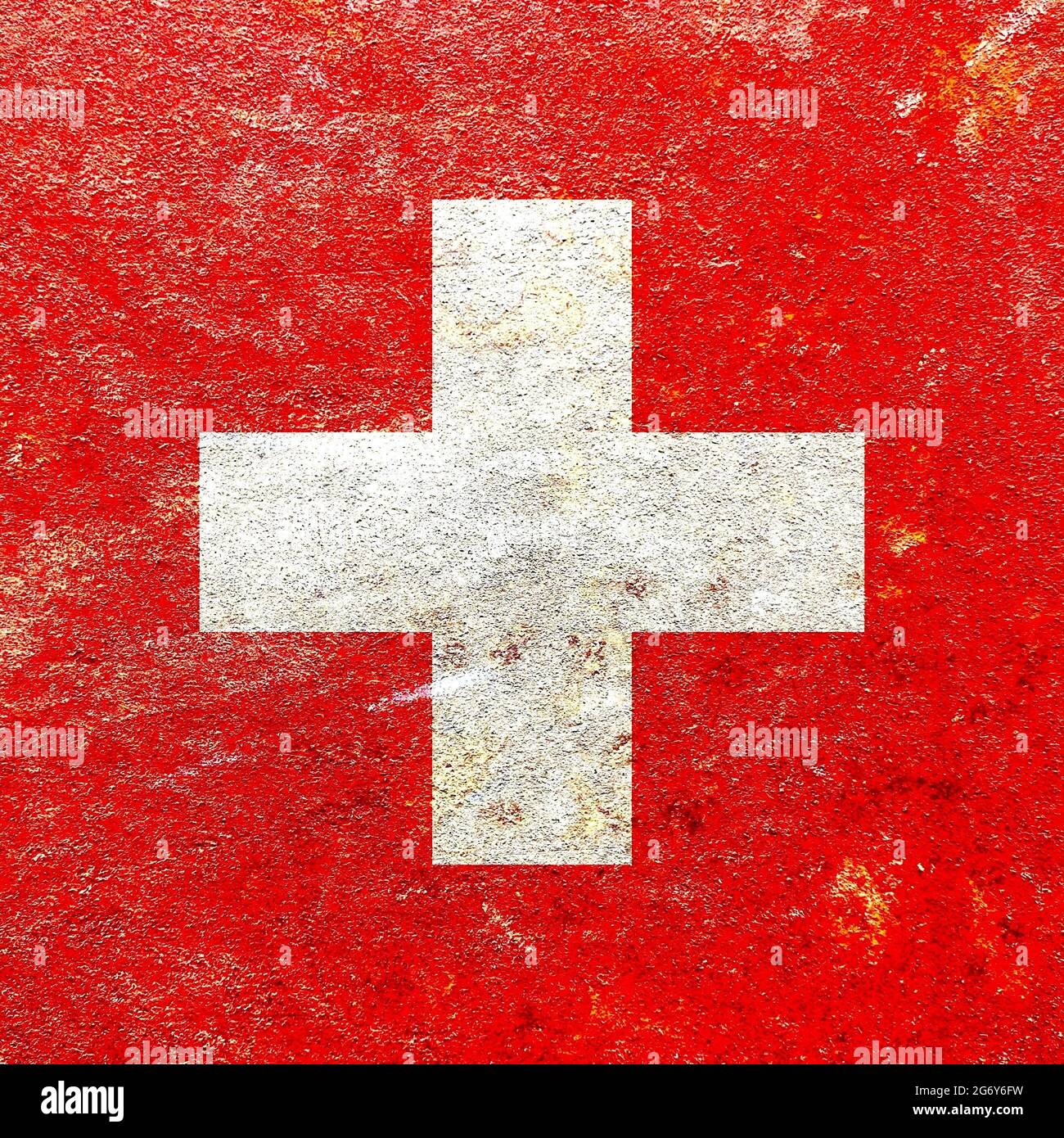 Grunge Switzerland flag pattern on a rusty mottled iron wall background, faded old glory concept Stock Photo
