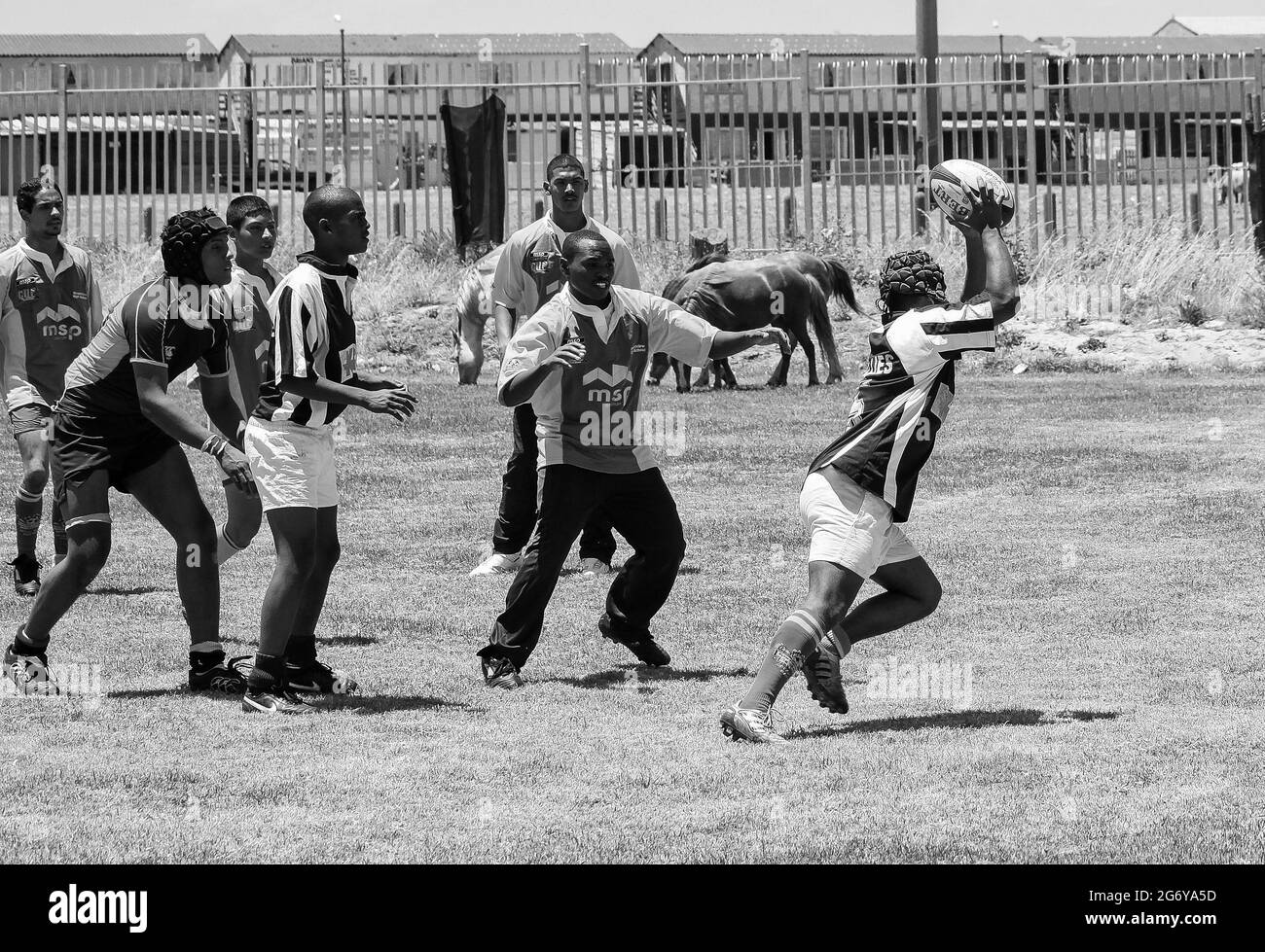 CAPE TOWN, SOUTH AFRICA - Jan 05, 2021: Cape Town, South Africa, December 06, 2011, Diverse children playing Rugby at school Stock Photo