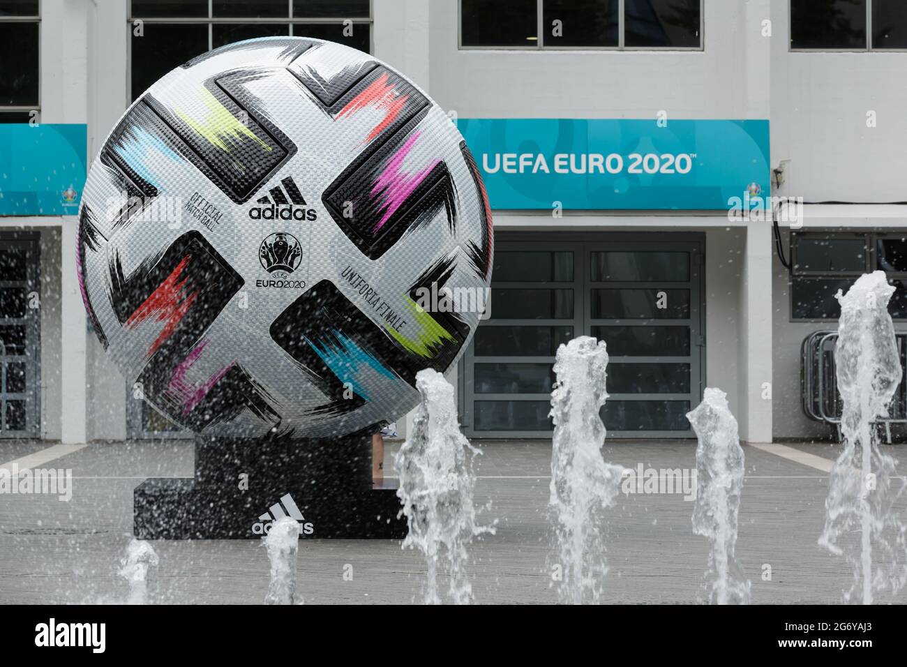 Wembley Stadium, Wembley Park, UK. 9th July 2021. A giant replica Adidas  'UNIFORIA FINALE' football - the official match ball for the finals - is on  display in Arena Square. 60,000 fans