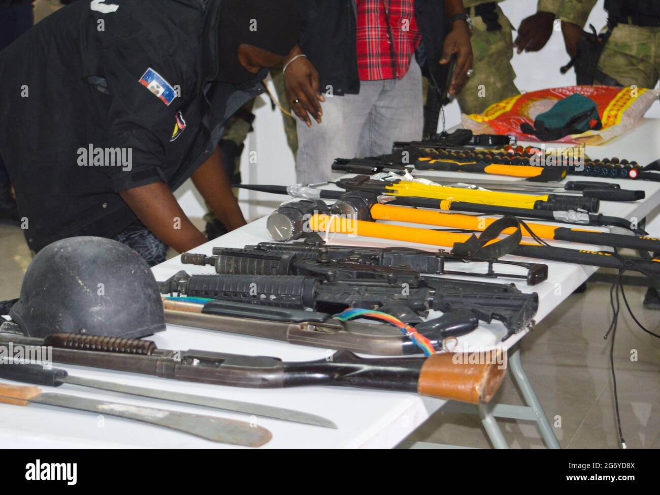 Port Au Prince. 9th July, 2021. Seized guns are displayed at a press conference in Port-au-Prince, Haiti, July 8, 2021. Haitian police arrested 15 Colombians and two Haitian Americans suspected in connection with the assassination of Haitian President Jovenel Moise, officials announced Thursday. Credit: Tcharly Coutin/Xinhua/Alamy Live News Stock Photo