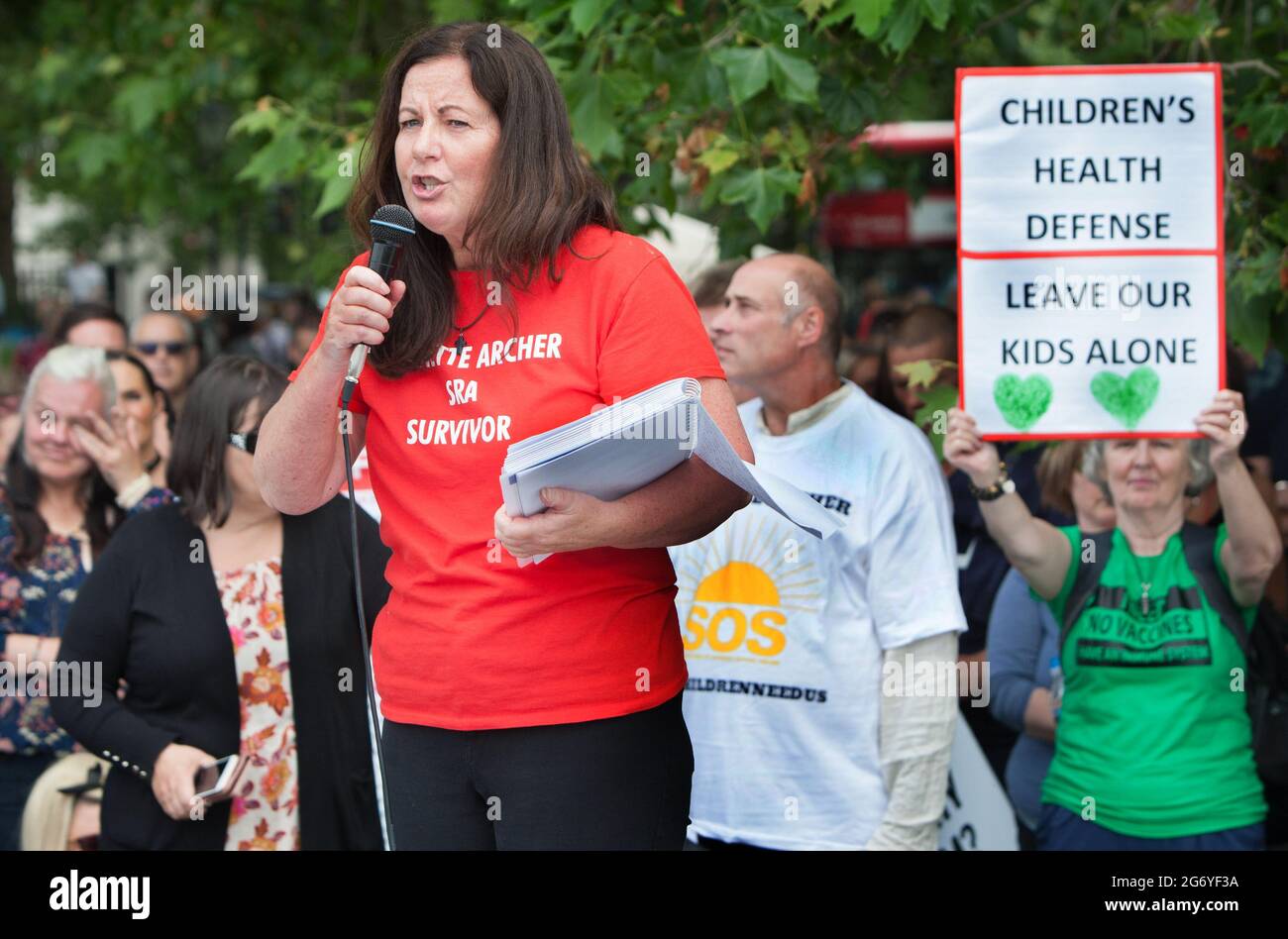 London, UK. 26th June, 2021. Jeanette Archer speaks to a crowd of protesters claiming herself a survivor of satanic ritual abuse during the demonstration. Protesters gather together in Hyde Park, London to expose Satanic Ritual Abuse. The group want to bring this type of child abuse into the open and expose high ranking Satanists that they say hold powerful positions in the UK. (Photo by Martin Pope/SOPA Images/Sipa USA) Credit: Sipa USA/Alamy Live News Stock Photo