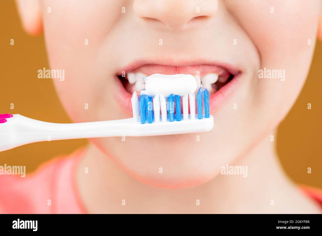 Health care, dental hygiene. Joyful child shows toothbrushes. Little boy cleaning teeth. Dental hygiene. Happy little kid brushing her teeth. Kid boy Stock Photo