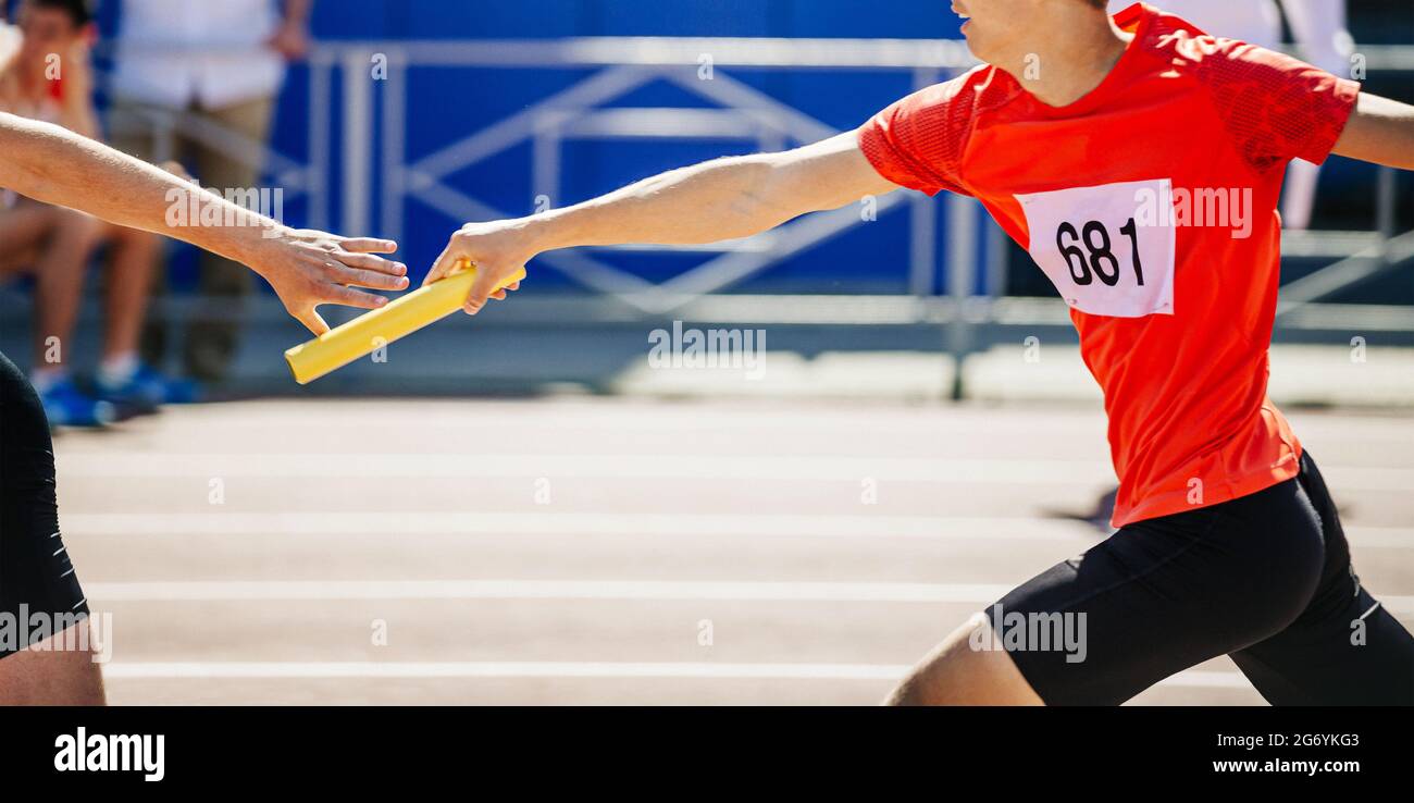 men relay race running track and field competition Stock Photo Alamy