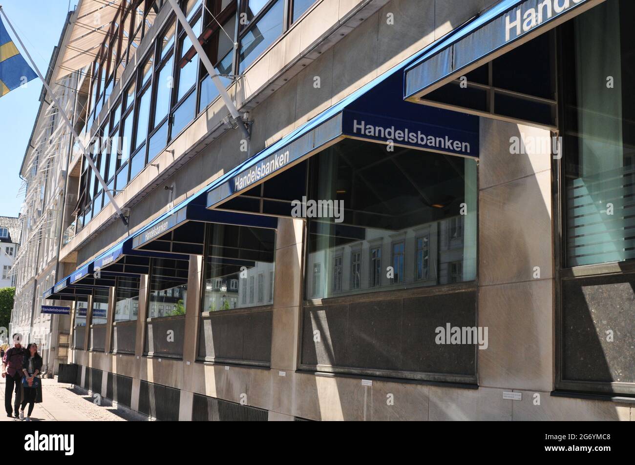 Copenhagen /Denmark./ 14.June 2019/ .Swedish Embassy and Swedish Handelsbanken have smae adress in same building Amaliengade in Copenhagen Denmark and swedish flags fly along wit european union blue flag with star on building in Copenhagen Denmark. (Photo..Francis Dean / Deanpictures. Stock Photo