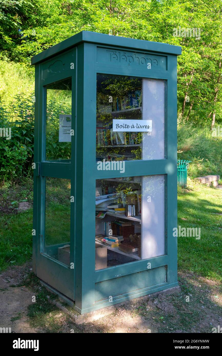 Herisson labeled Small City of Character. Book box in an old telephone