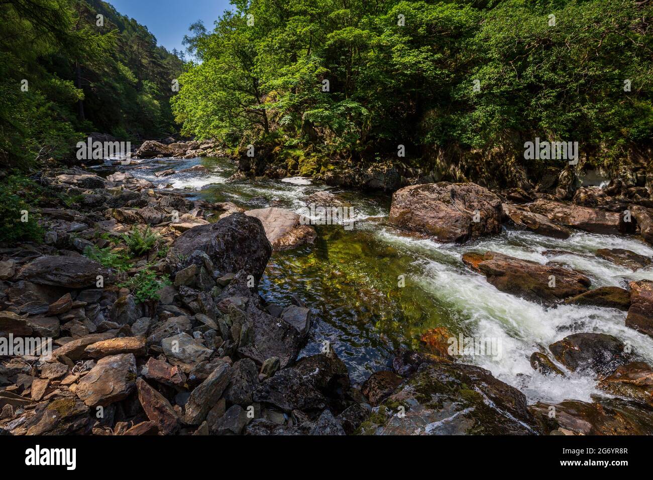 The Glaslyn River flowing through the Aberglaslyn Pass in the Snowdonia National Park, North Wales Stock Photo