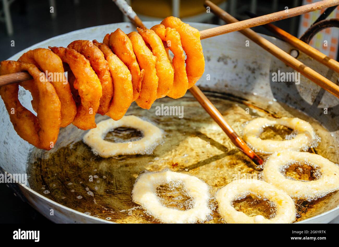Traditional peruvian Dessert: Picarones Made whit Sweet potato and wheat flour. Stock Photo
