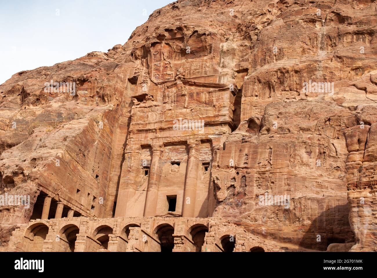 The ancient city of Petra in Jordan became one of the 7 New Wonders of the World. The city's carved rose-red sandstone rock facades, tombs, and temple Stock Photo