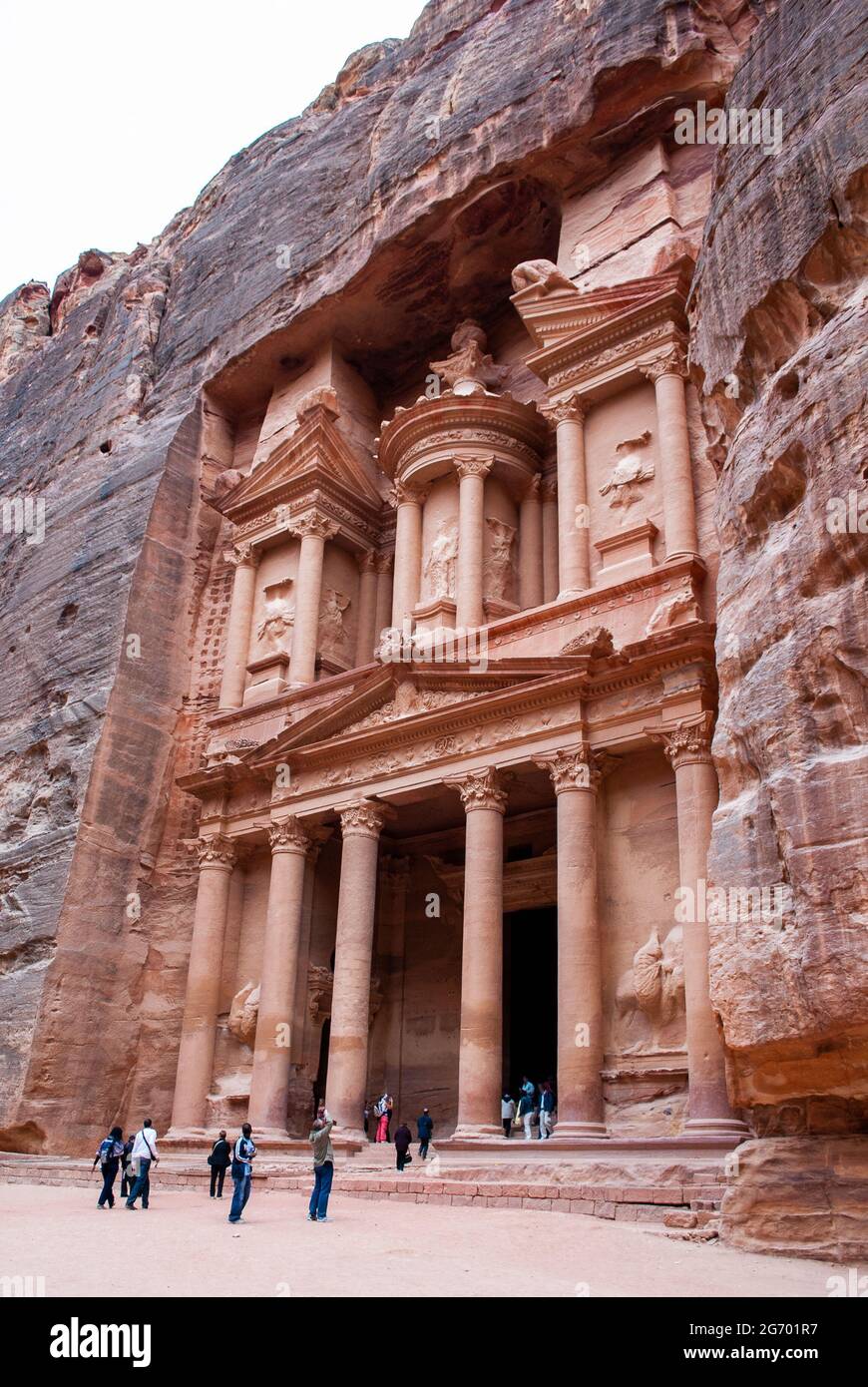 The ancient city of Petra in Jordan became one of the 7 New Wonders of the  World. The city's carved rose-red sandstone rock facades, tombs, and temple  Stock Photo - Alamy