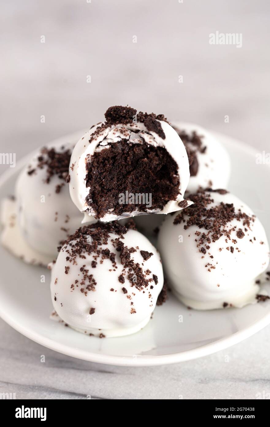 White Chocolate Covered Chocolate Sandwich Cookie Truffles Stock Photo