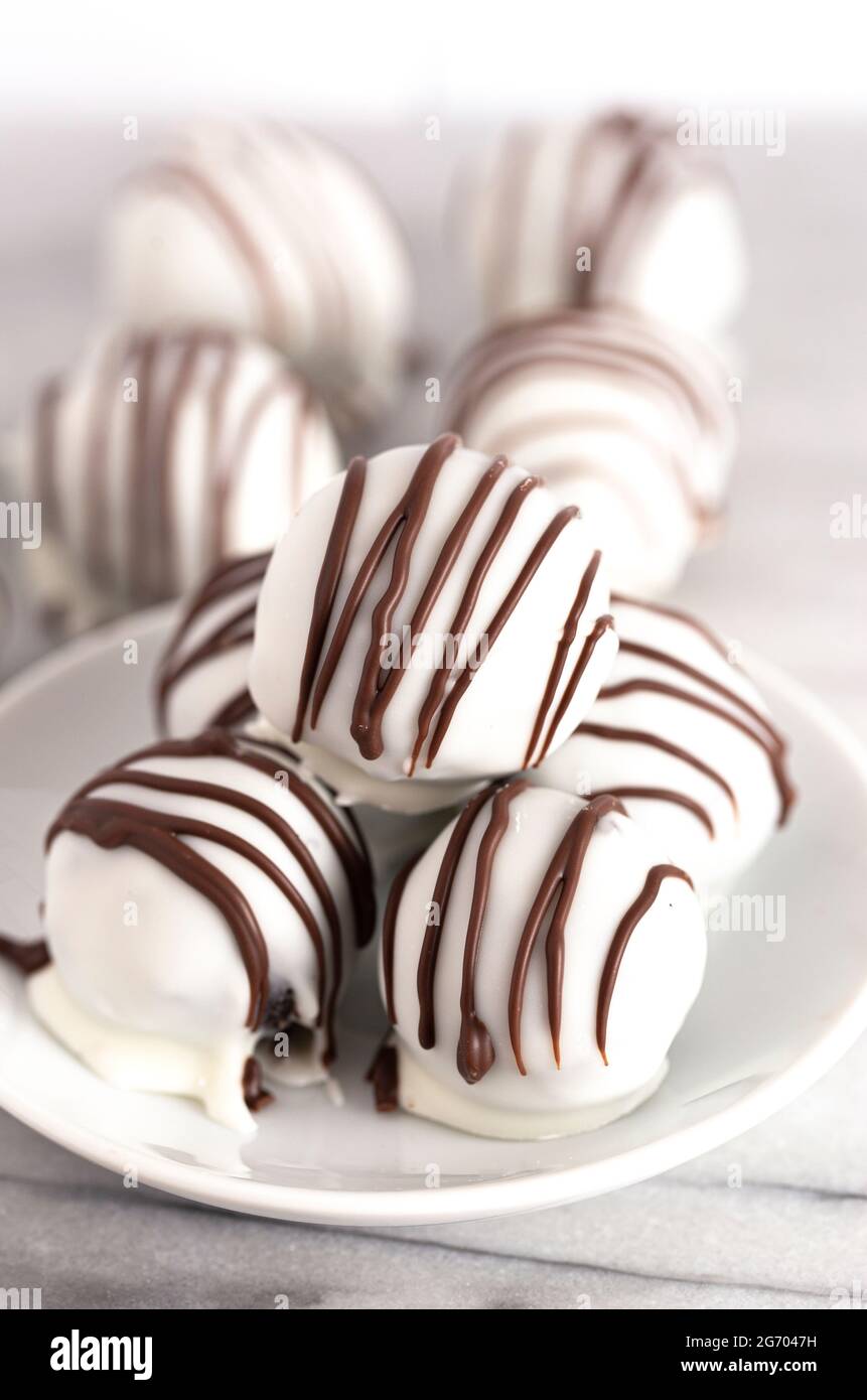 White Chocolate Covered Chocolate Sandwich Cookie Truffles Stock Photo
