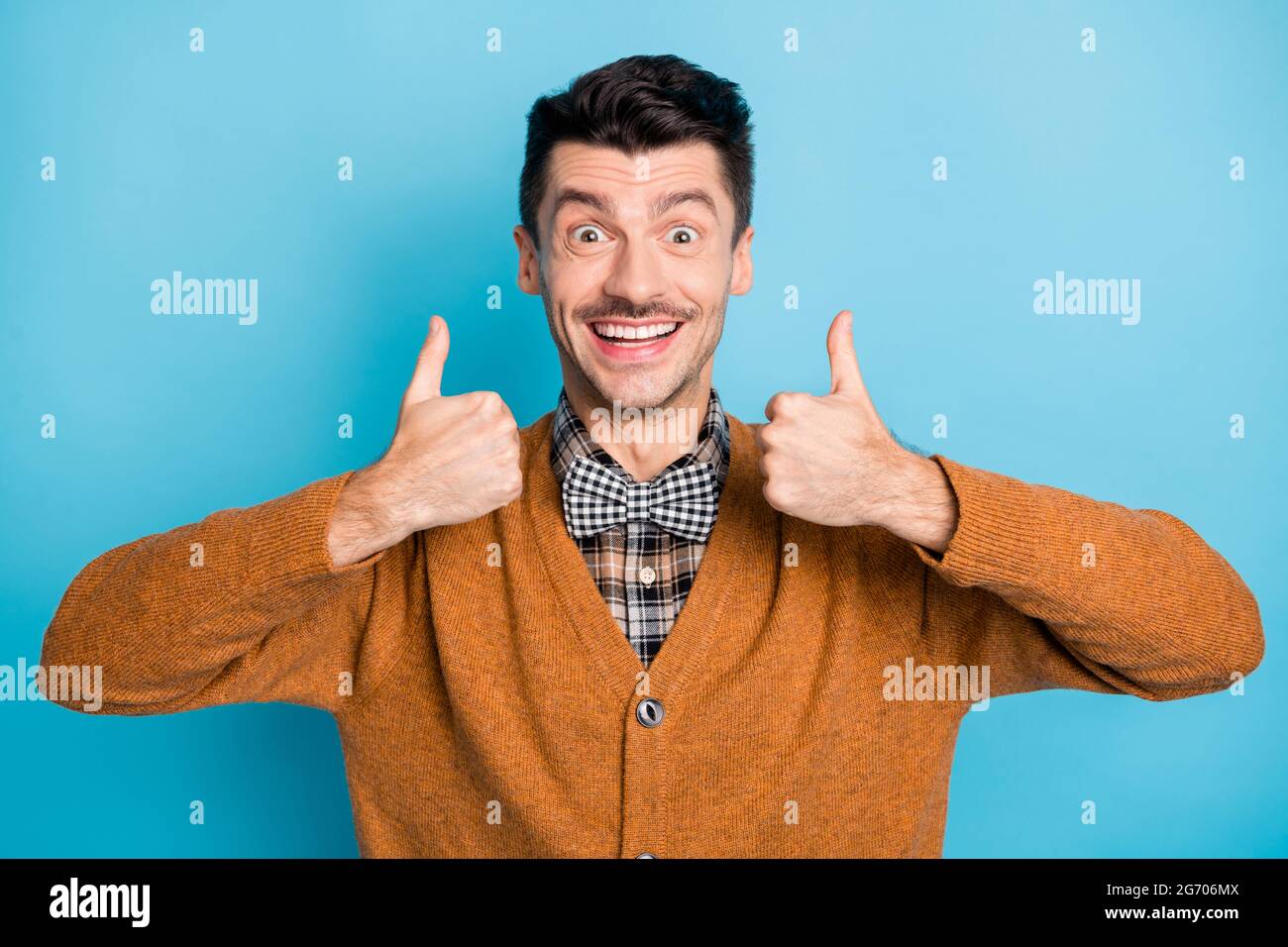 Photo of cheerful person beaming smile show two arms thumbs up have ...