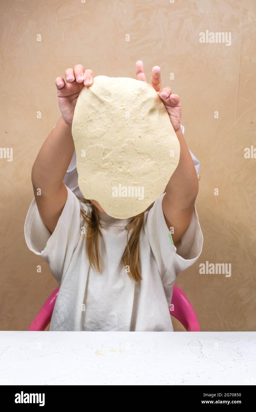 Child covers face by hand hi-res stock photography and images - Alamy